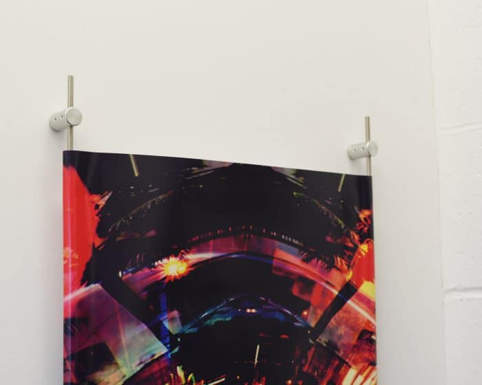 Banner Mounted with 6mm Rod and Wall Mount Rod Holders