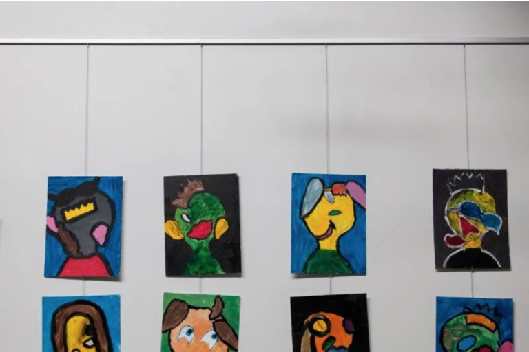 Silver Mini-rail with Steel Cable on Cobra with Zipper Hook Holding Unframed Artwork